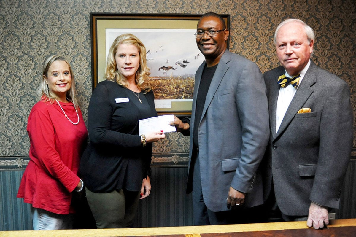 Modern Woodmen Talladega Rotary Club donate $500 to Talladega High School